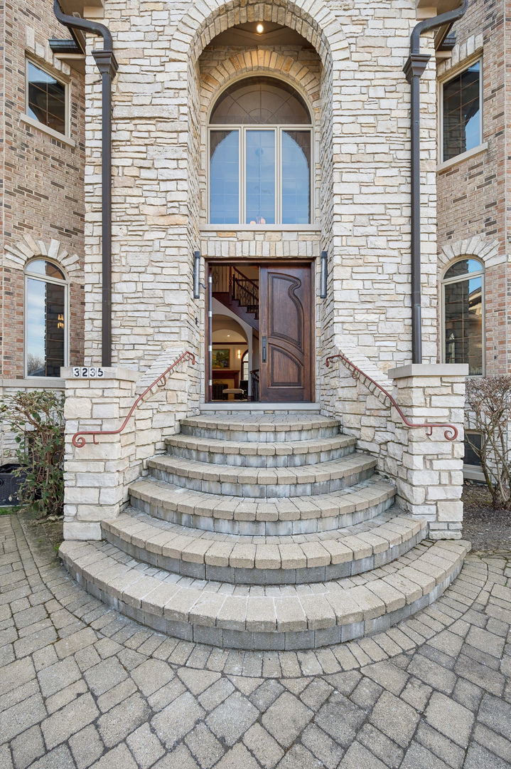 3235 Techny Road Northbrook, IL 60062 - Photo 3 of 45 a view of house entrance