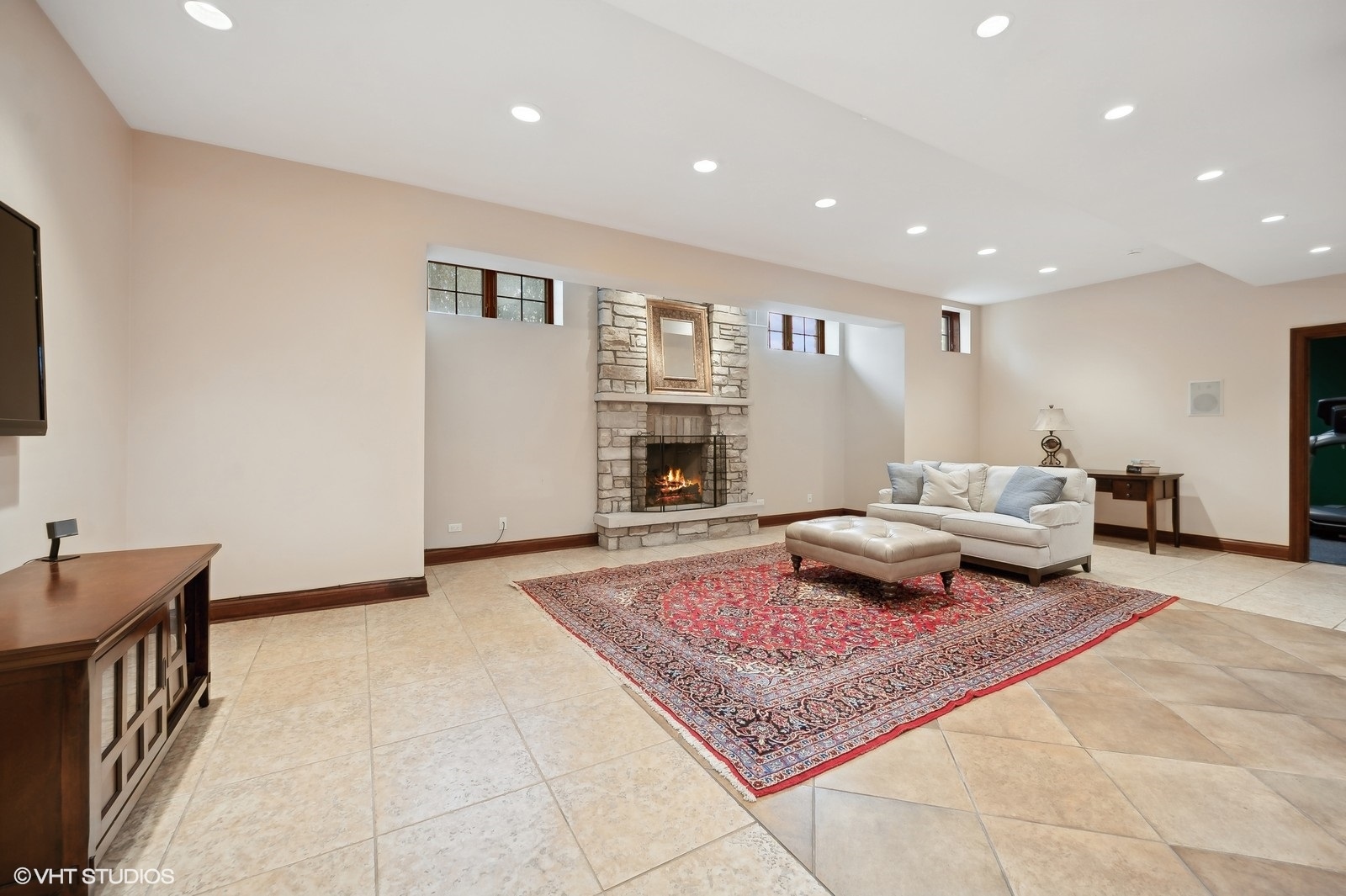 3235 Techny Road Northbrook, IL 60062 - Photo 33 of 45 a living room with furniture rug and a fireplace