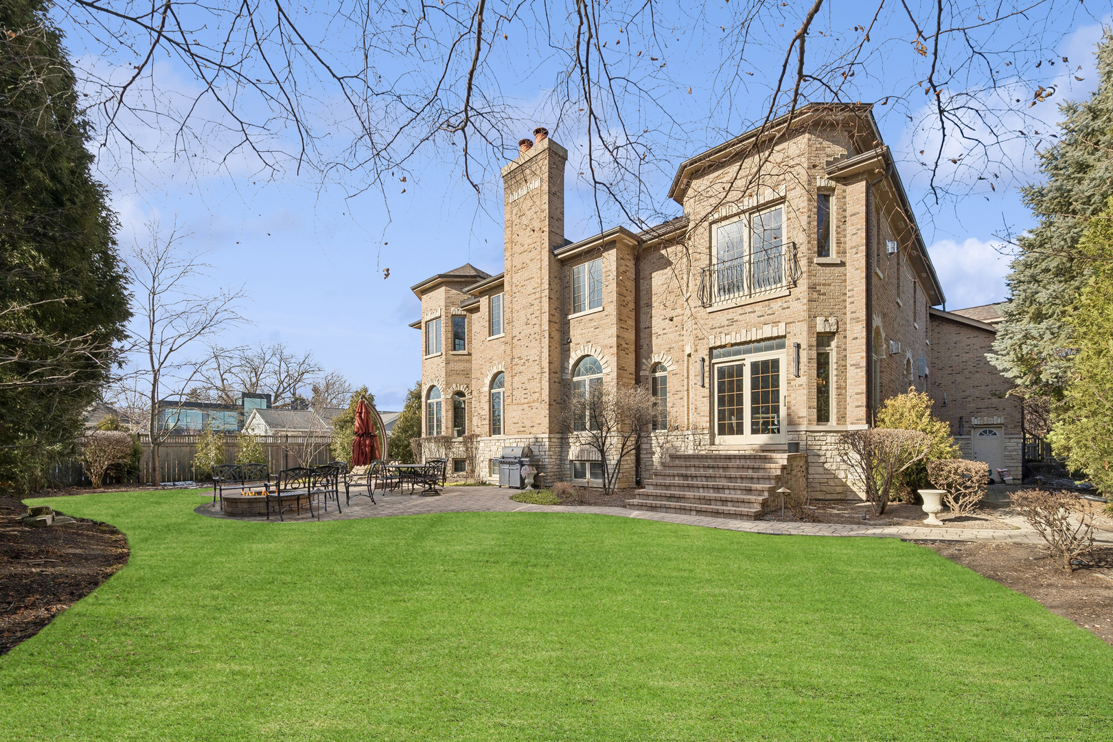 3235 Techny Road Northbrook, IL 60062 - Photo 39 of 45 a front view of a house with garden and sitting area