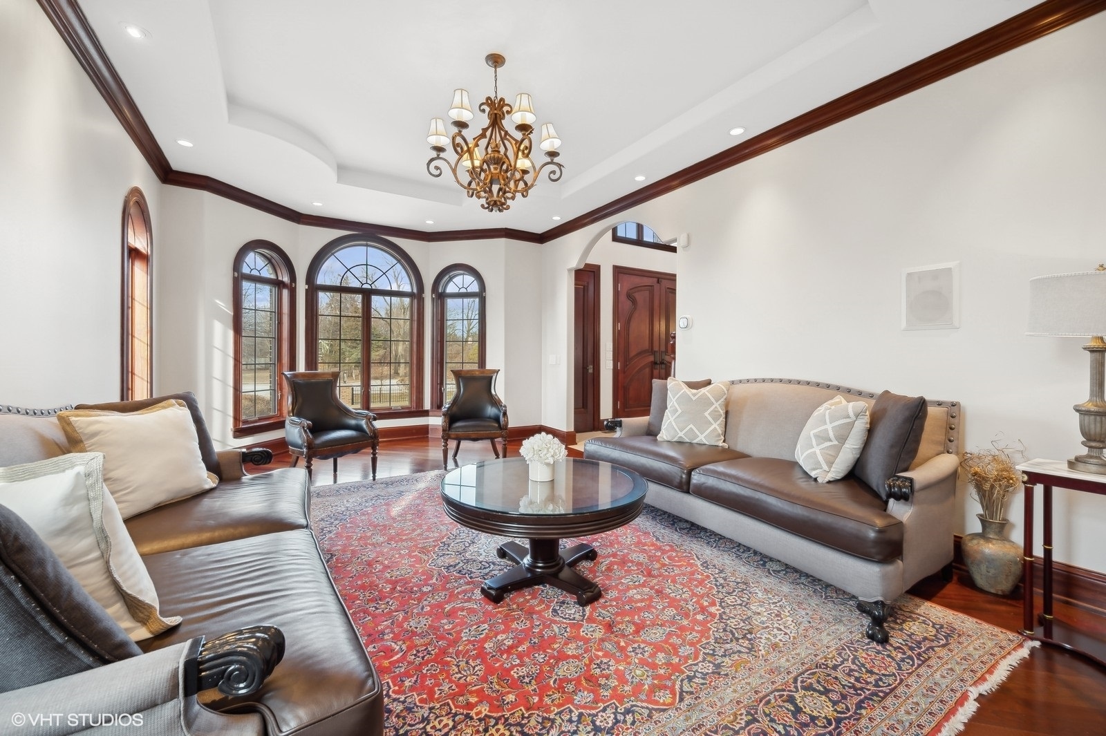 3235 Techny Road Northbrook, IL 60062 - Photo 5 of 45 a living room with furniture chandelier and a rug