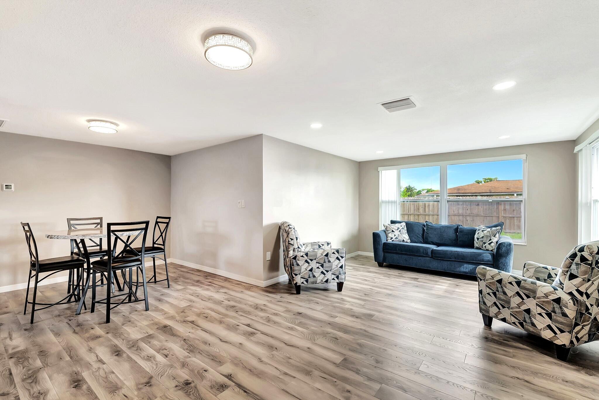 7611 Spirea Drive Port Richey, FL 34668 - Photo 12 of 31 Open Living Space