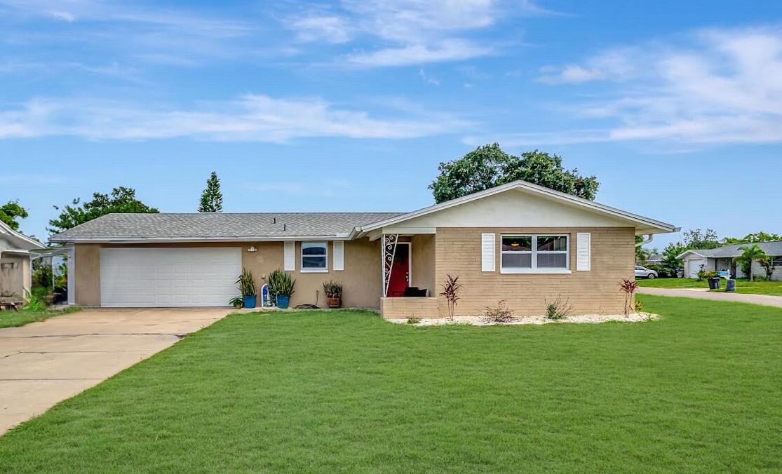 7611 Spirea Drive Port Richey, FL 34668 - Photo 2 of 31 Front Exterior