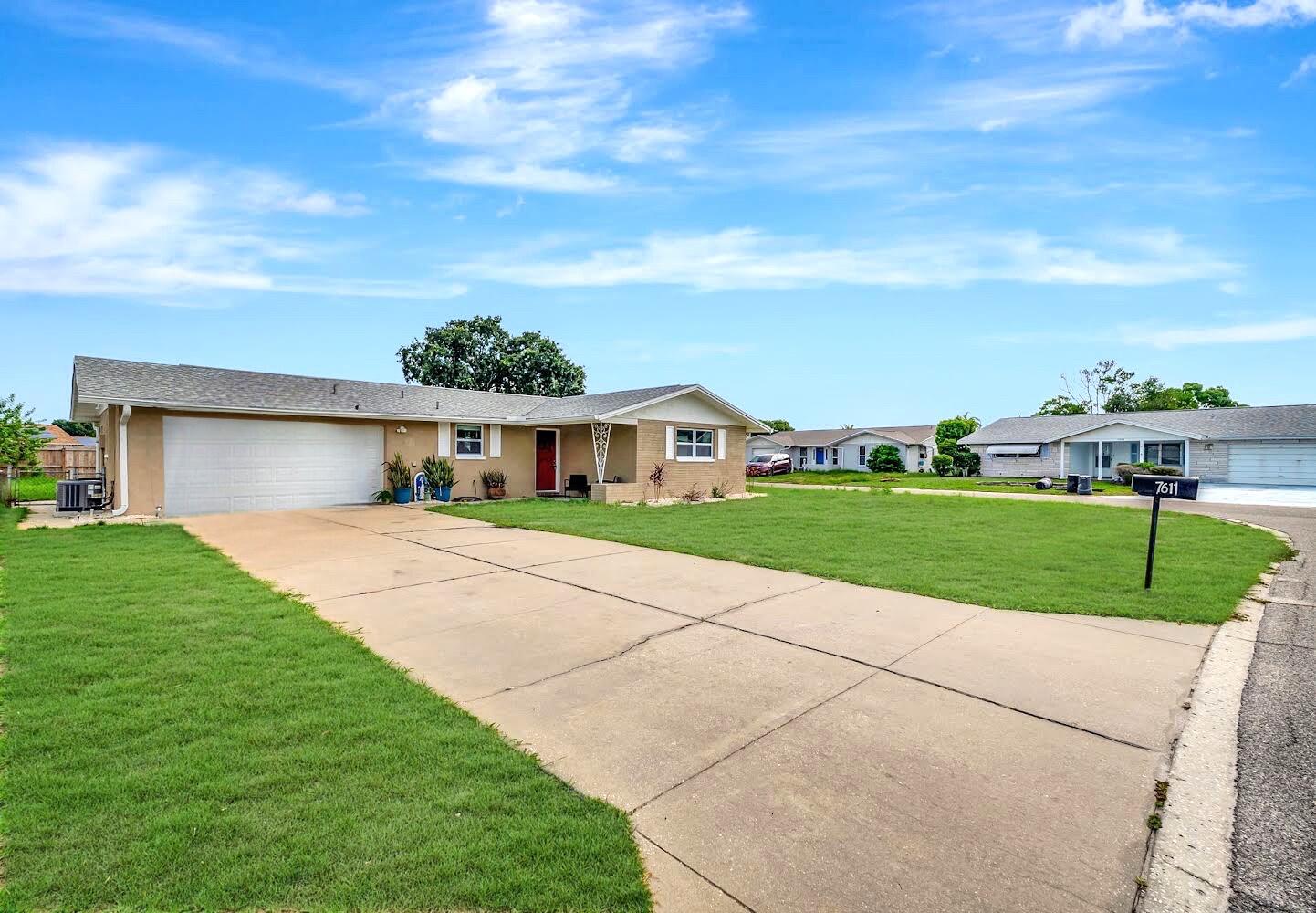 7611 Spirea Drive Port Richey, FL 34668 - Photo 3 of 31 Driveway