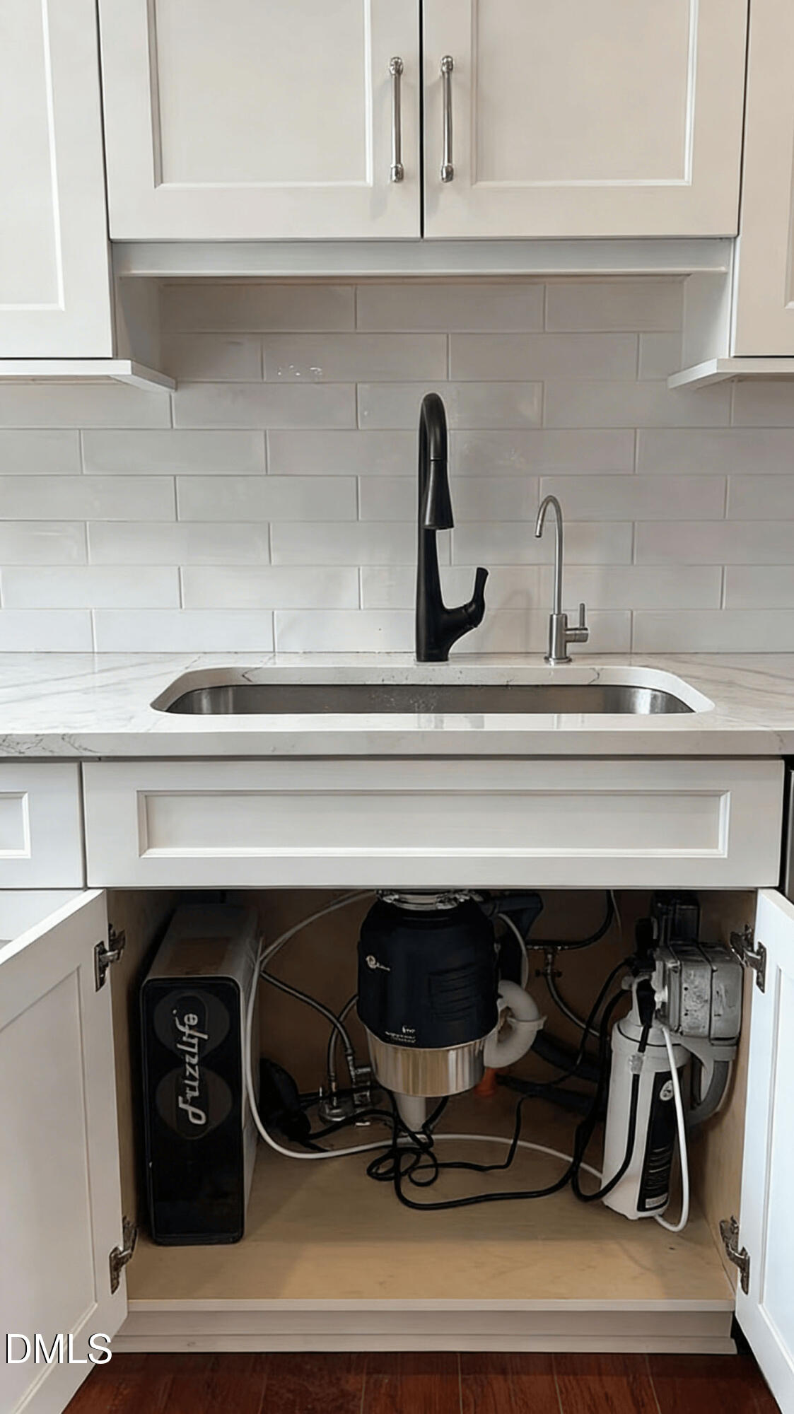 409 Rockingham Street Carthage, NC 28327 - Photo 15 of 56 a close view of a sink and a stove