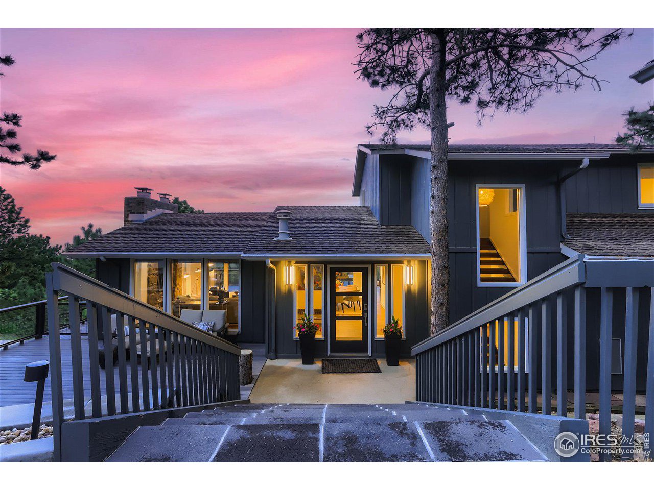 252 Pine Tree Lane Boulder, CO 80304 - Photo 1 of 39 a view of a house with wooden fence