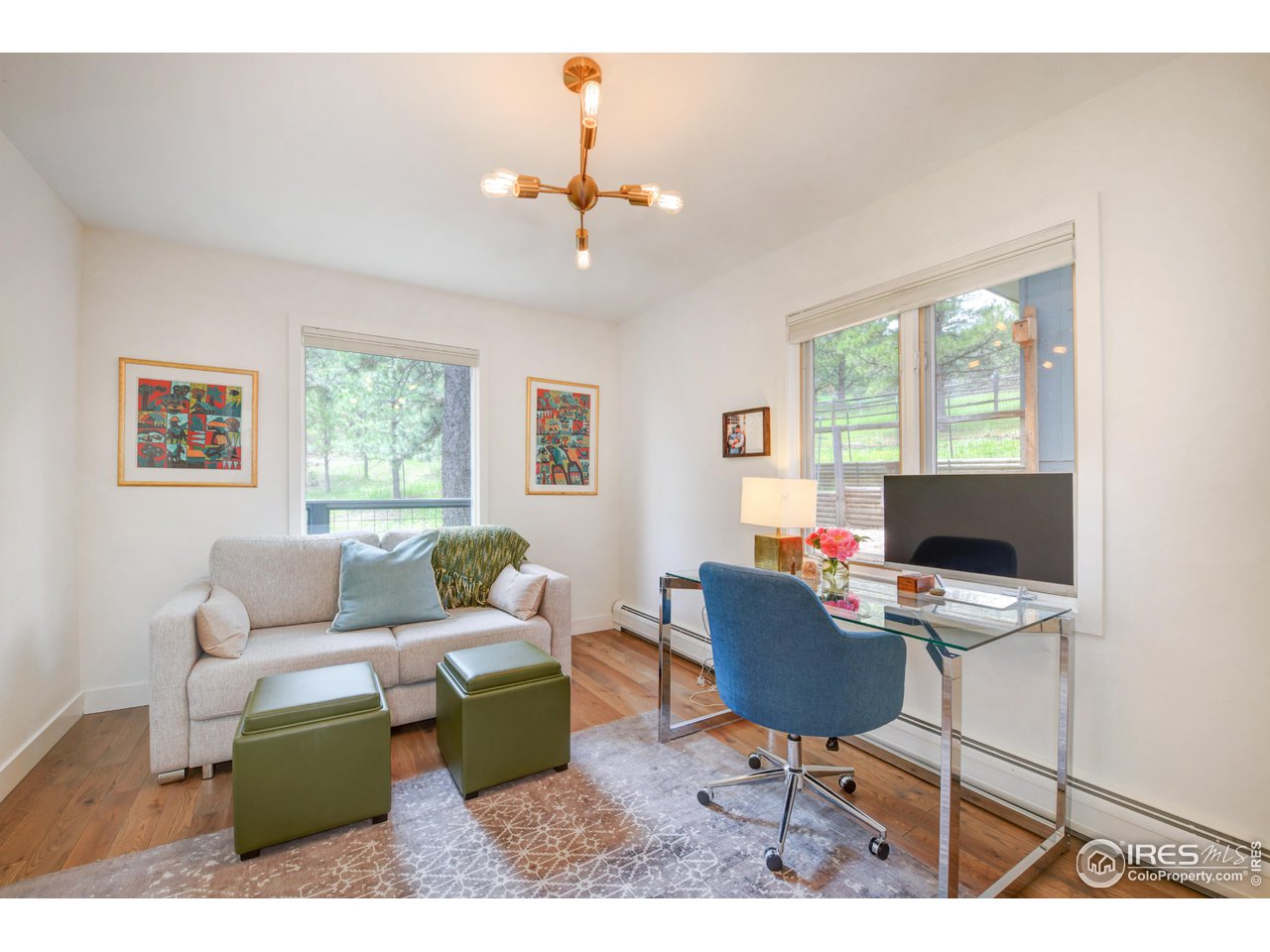 252 Pine Tree Lane Boulder, CO 80304 - Photo 14 of 39 a living room with furniture and a large window