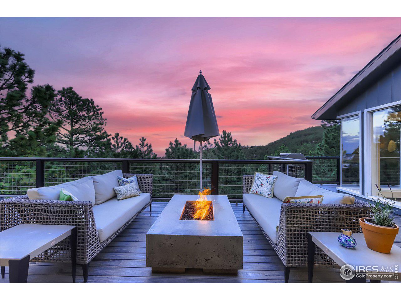 252 Pine Tree Lane Boulder, CO 80304 - Photo 2 of 39 a view of sitting area and swimming pool in the back