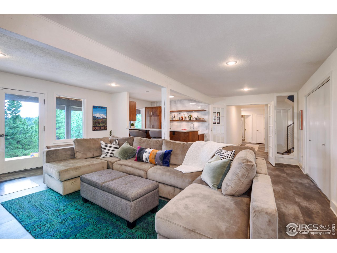 252 Pine Tree Lane Boulder, CO 80304 - Photo 22 of 39 a living room with furniture and a large window