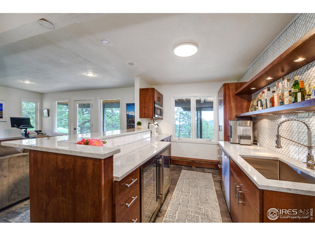 252 Pine Tree Lane Boulder, CO 80304 - Photo 25 of 39 a kitchen with a sink and large window