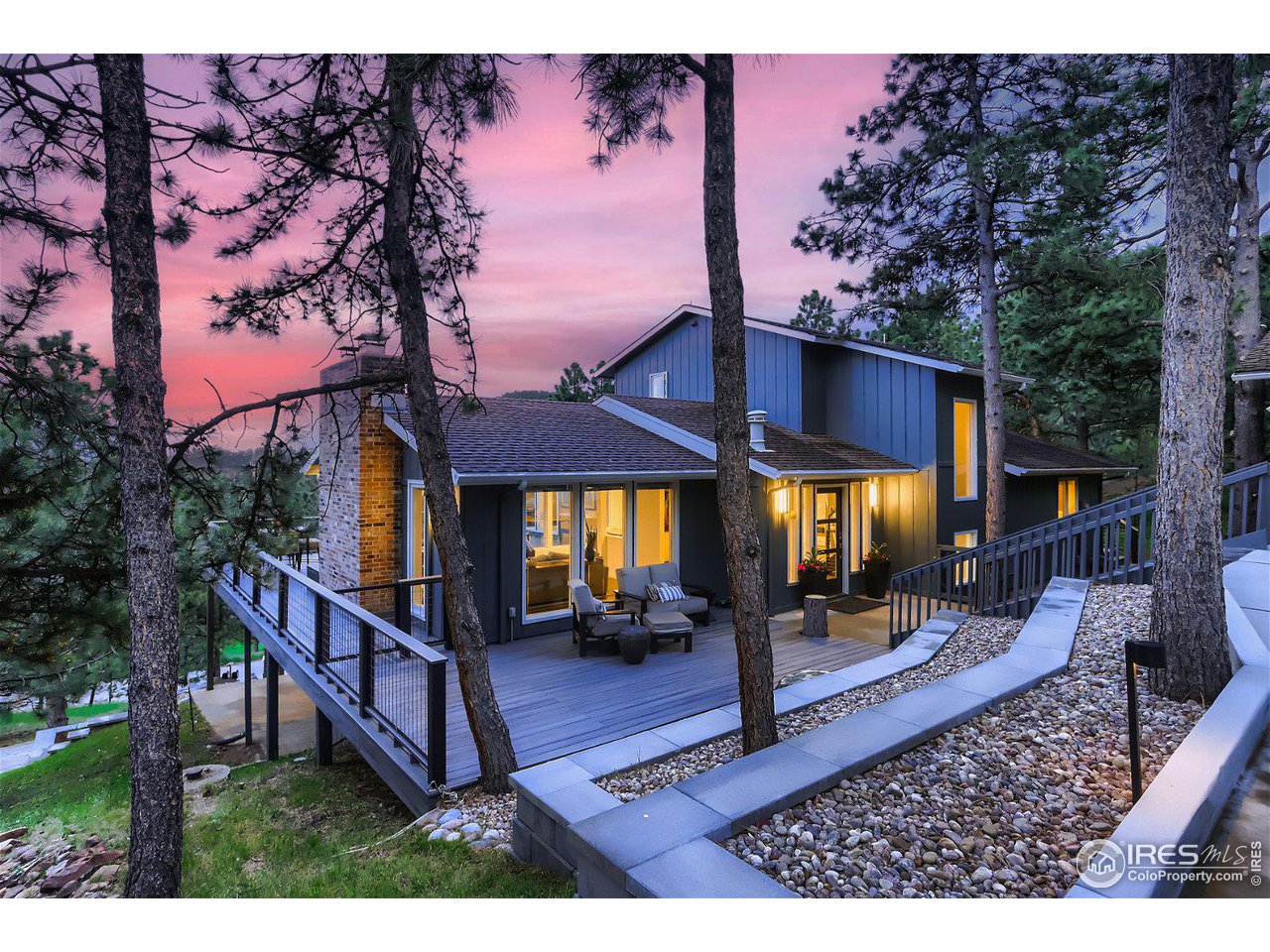 252 Pine Tree Lane Boulder, CO 80304 - Photo 32 of 39 a view of a house with backyard and sitting area