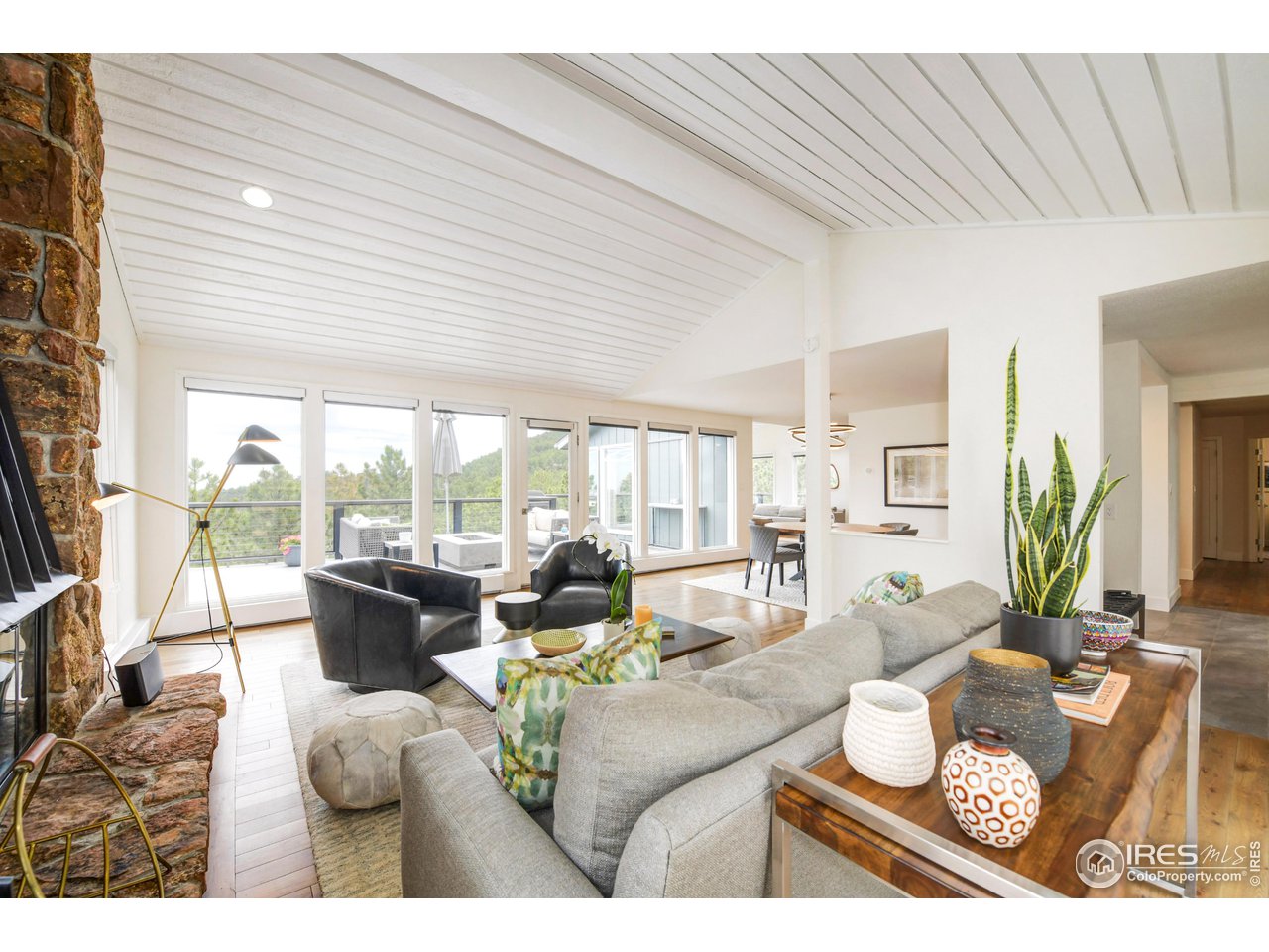 252 Pine Tree Lane Boulder, CO 80304 - Photo 5 of 39 a living room with furniture and a large window
