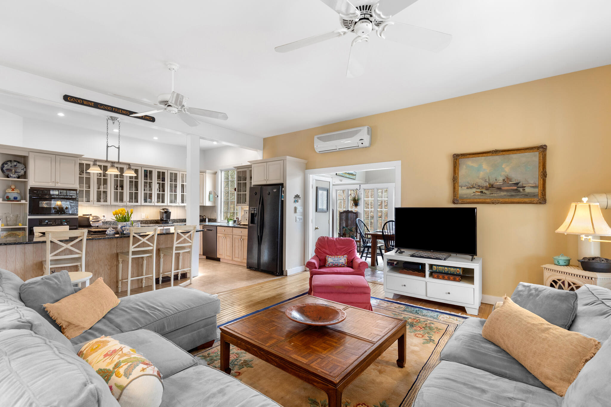 311 South Sunken Meadow Road Eastham, MA 02642 - Photo 18 of 57 a living room with furniture and a flat screen tv