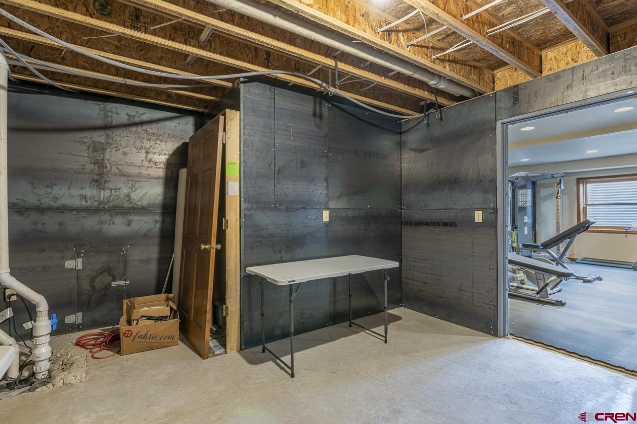 1403 Skyview Road Bayfield, CO 81122 - Photo 15 of 35 a bathroom with a tub and shower