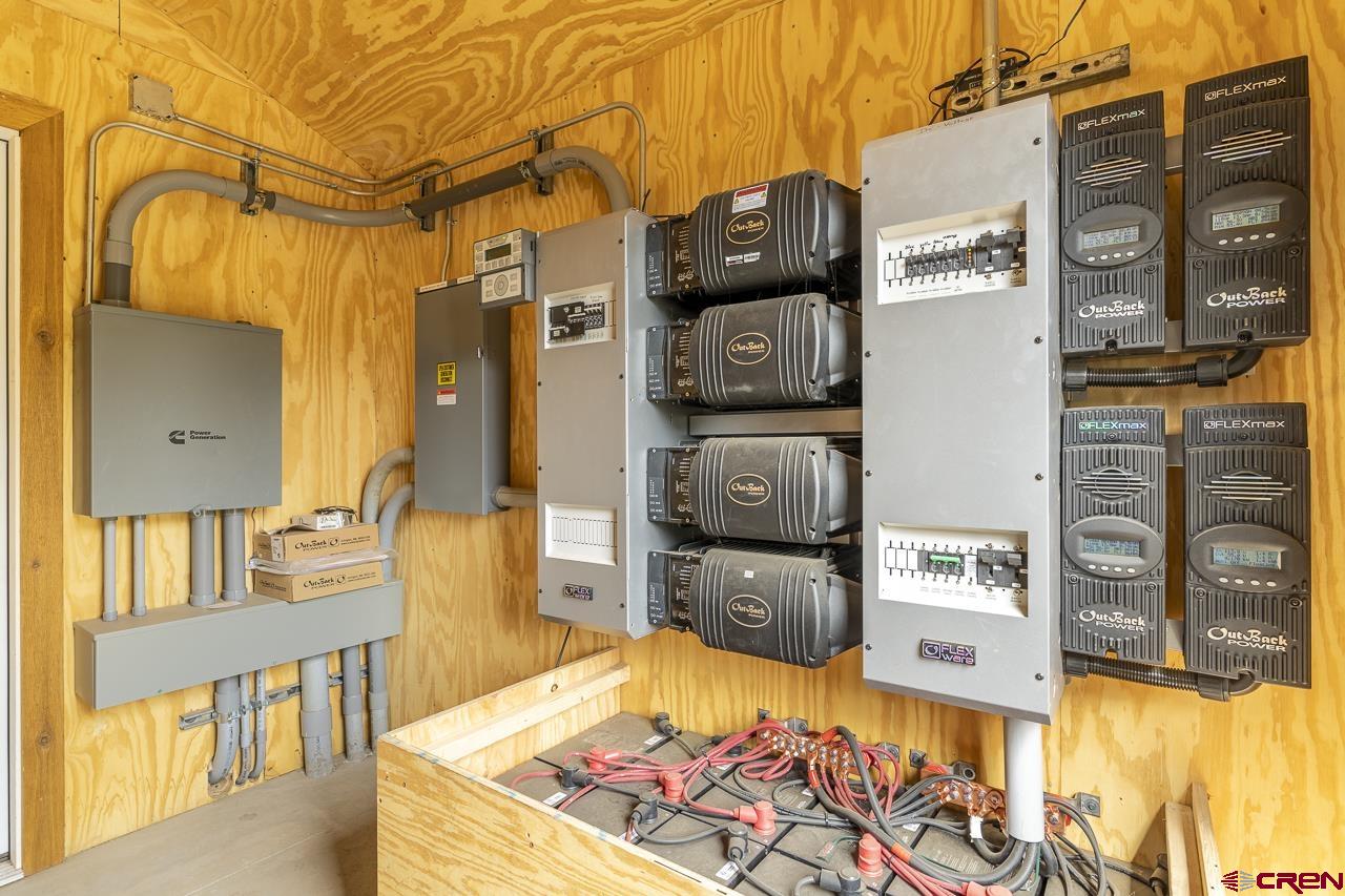 1403 Skyview Road Bayfield, CO 81122 - Photo 26 of 35 a view of a living room filled with furniture and a flat screen tv