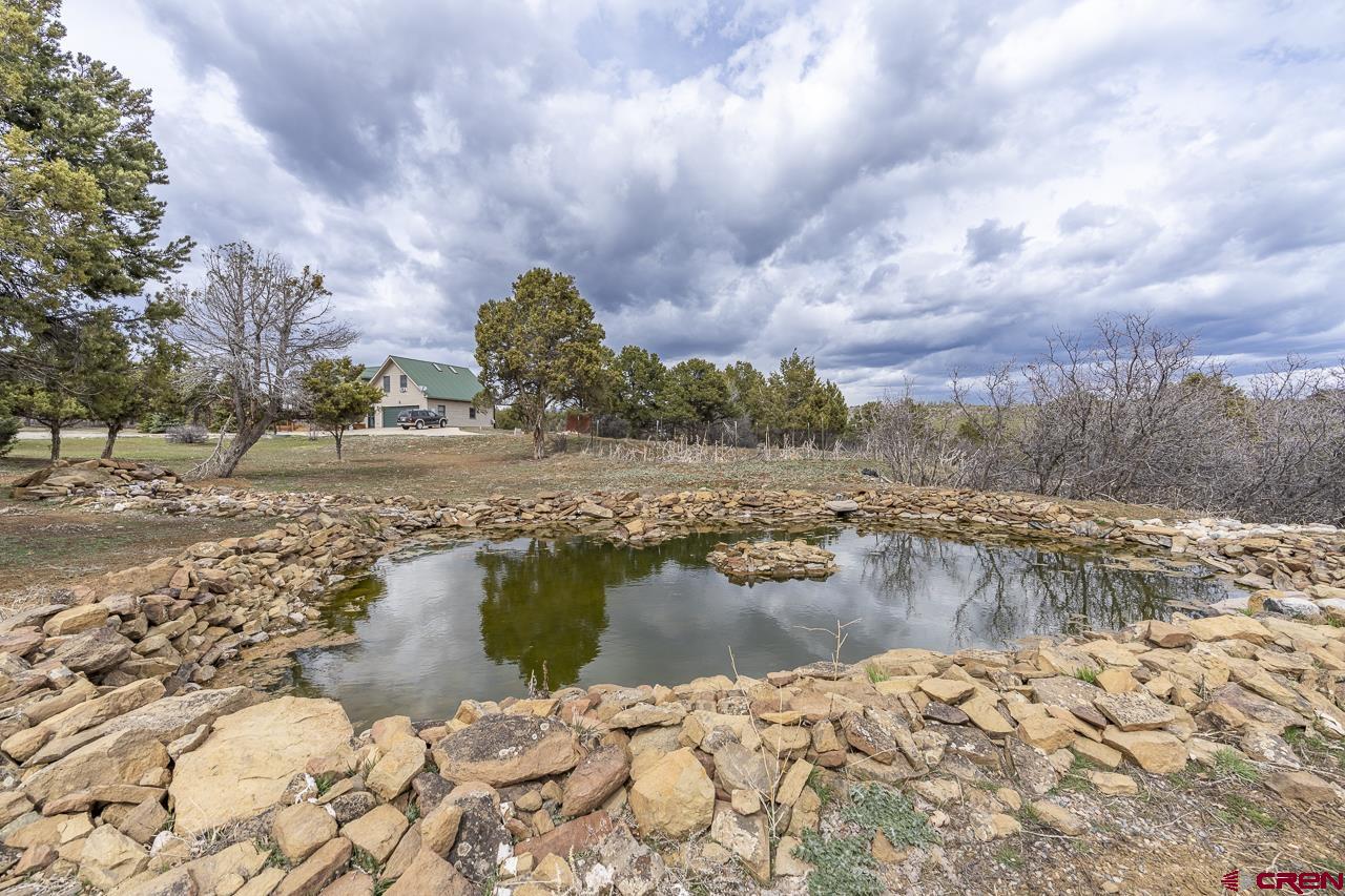 1403 Skyview Road Bayfield, CO 81122 - Photo 27 of 35 a view of a lake with beach and city space