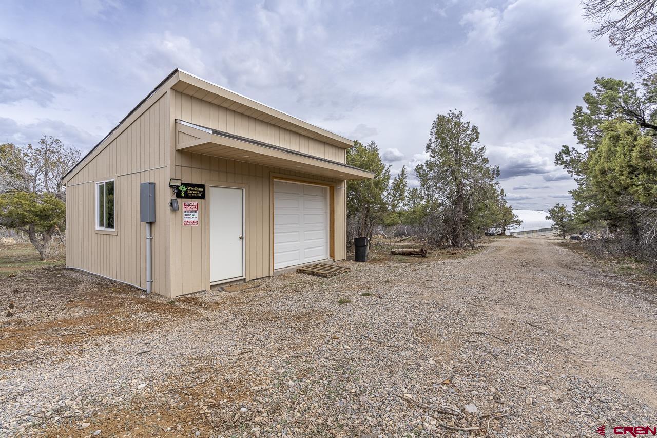 1403 Skyview Road Bayfield, CO 81122 - Photo 29 of 35 a view of a house with a yard