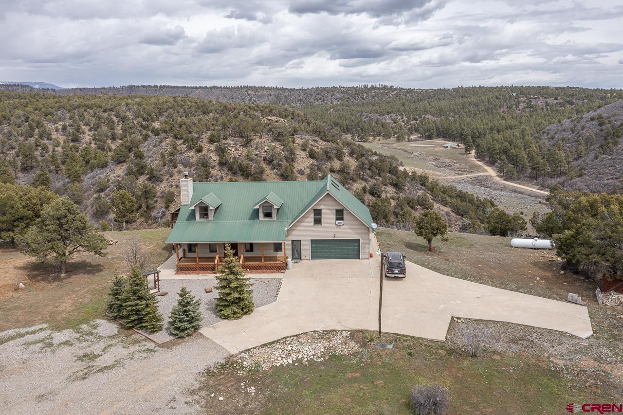 1403 Skyview Road Bayfield, CO 81122 - Photo 34 of 35 an aerial view of a house