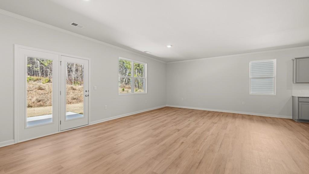 2930 Daxton Lane Gainesville, GA 30507 - Photo 12 of 32 wooden floor in an empty room with a window