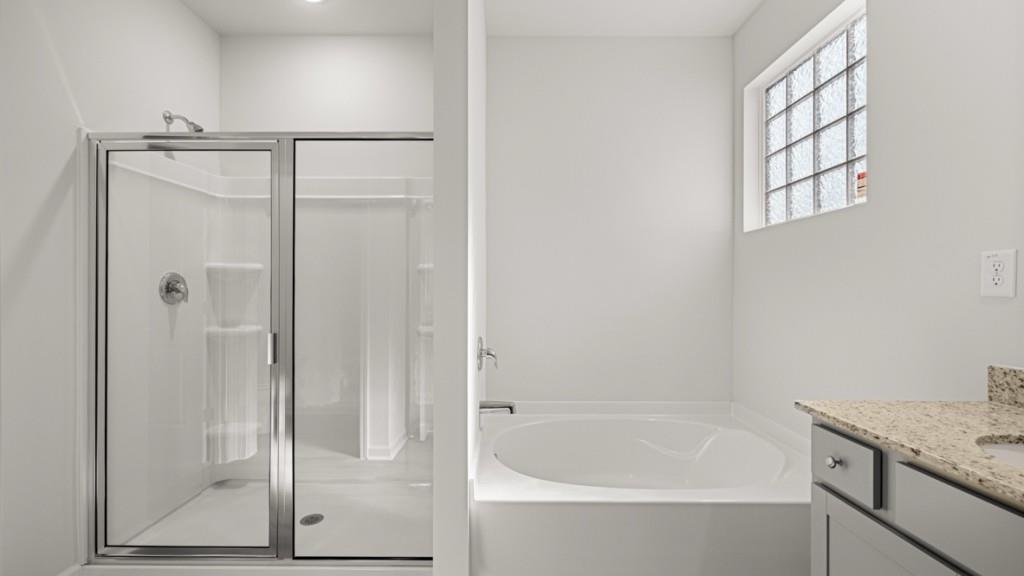 2930 Daxton Lane Gainesville, GA 30507 - Photo 20 of 32 a white bath tub sitting next to a shower