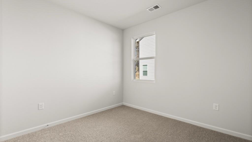2930 Daxton Lane Gainesville, GA 30507 - Photo 23 of 32 an empty room with a window