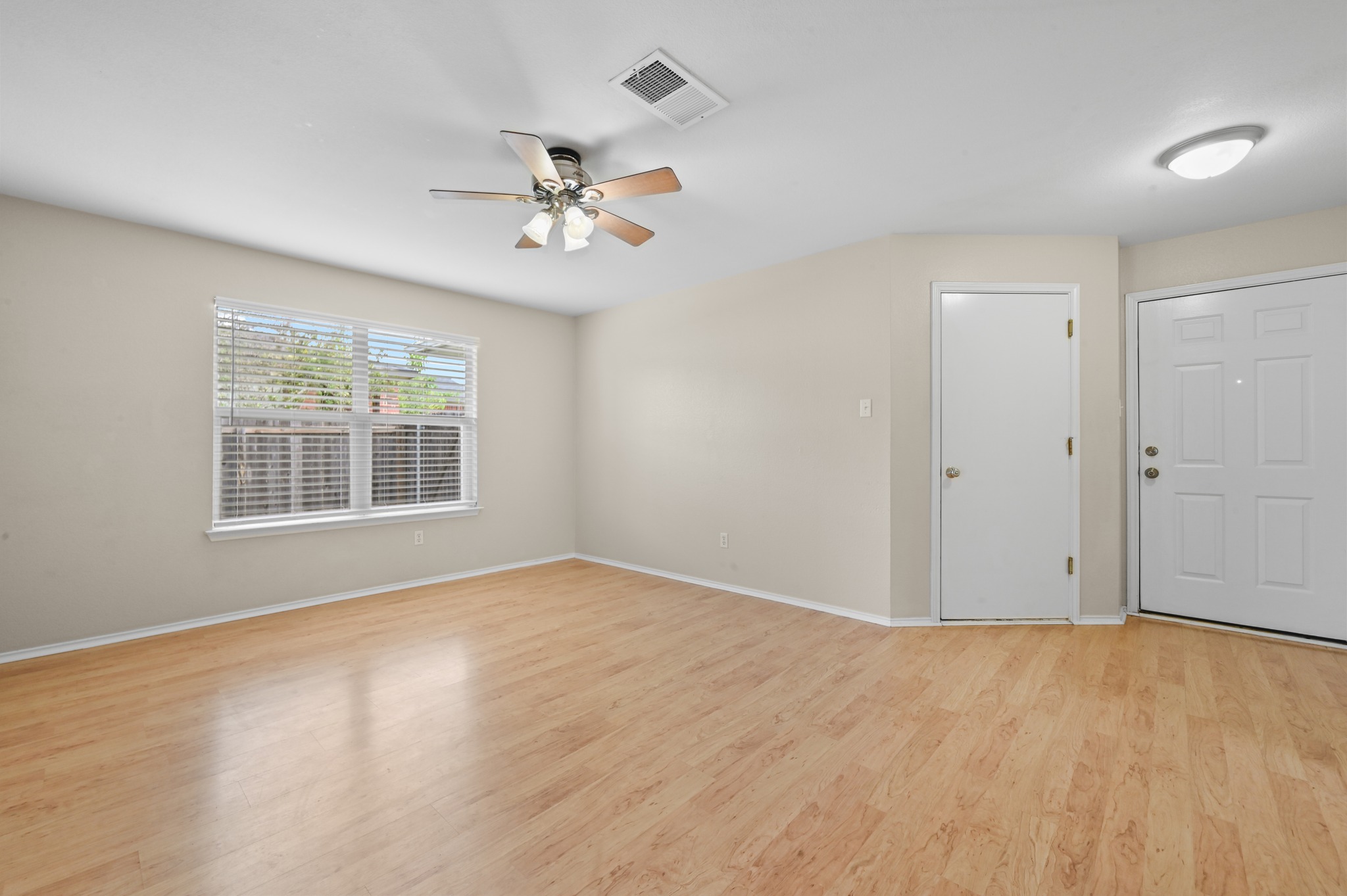 112 Mason Reed Cove Kyle, TX 78640 - Photo 6 of 26 a view of an empty room with a window