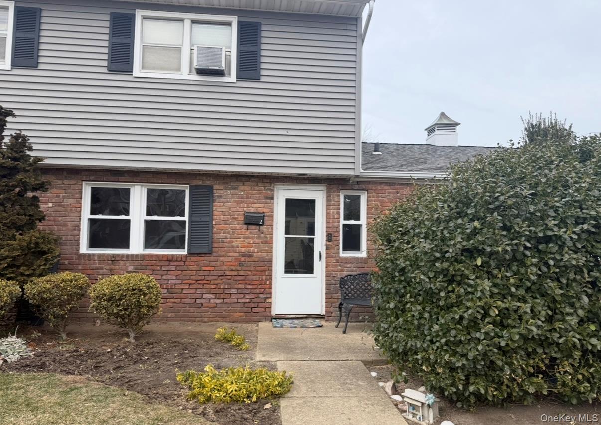 855 East Walnut Street, Unit 2 Long Beach, NY 11561 - Photo 1 of 1 front view of a house