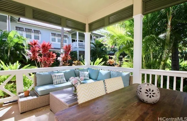 a outdoor living space with furniture and garden view