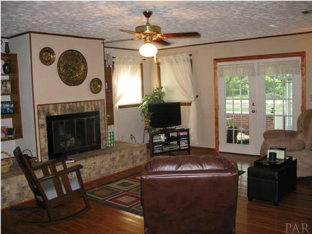 5200 Cerny Road Pensacola, FL 32526 - Photo 2 of 19 Family room with brick fireplace