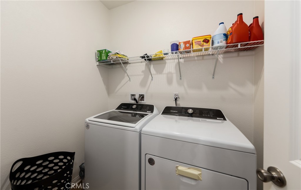 19778 Limon Court Riverside, CA 92507 - Photo 16 of 26 a utility room with dryer and washer