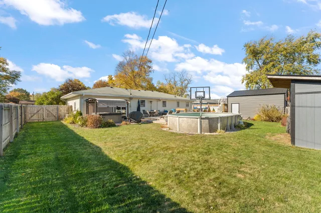 a view of a house with a big yard