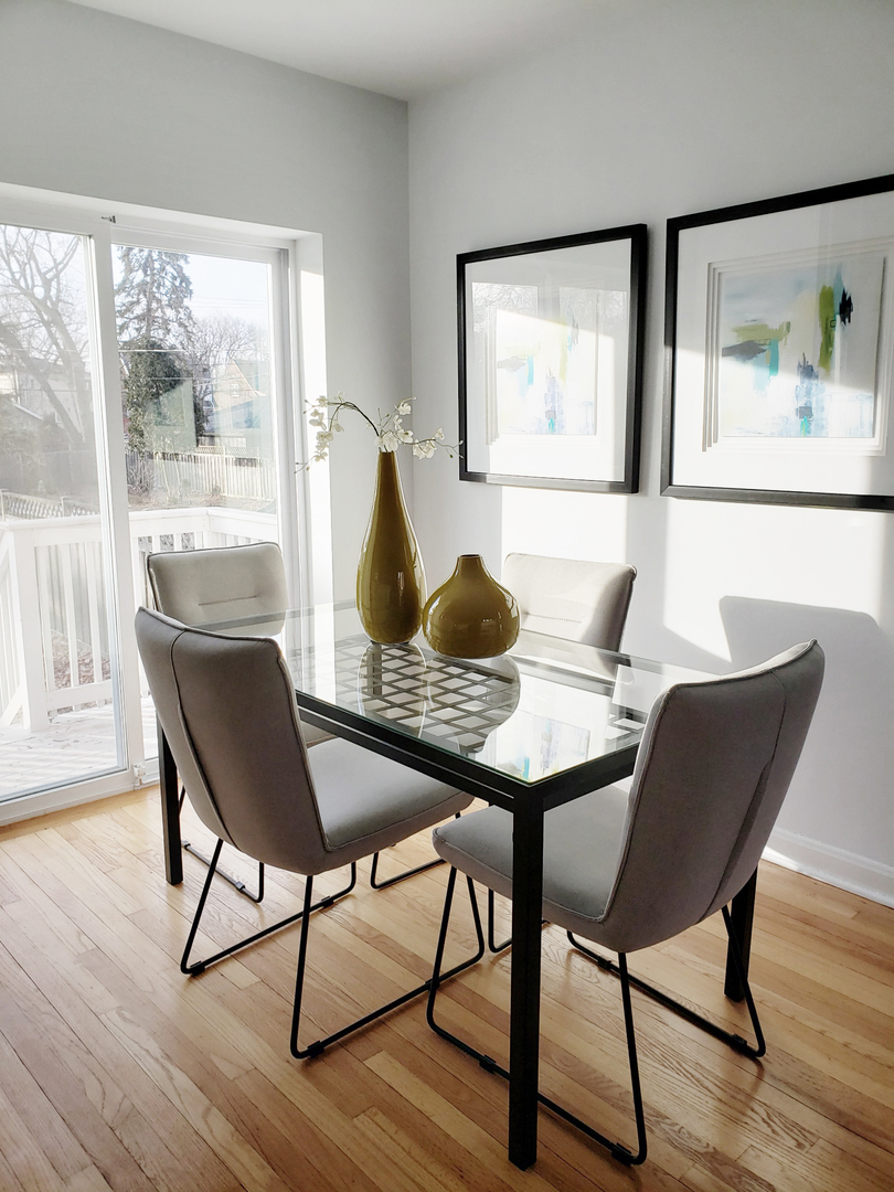 57 Northgate Road Riverside, IL 60546 - Photo 12 of 28 a view of a dining room with furniture window and wooden floor