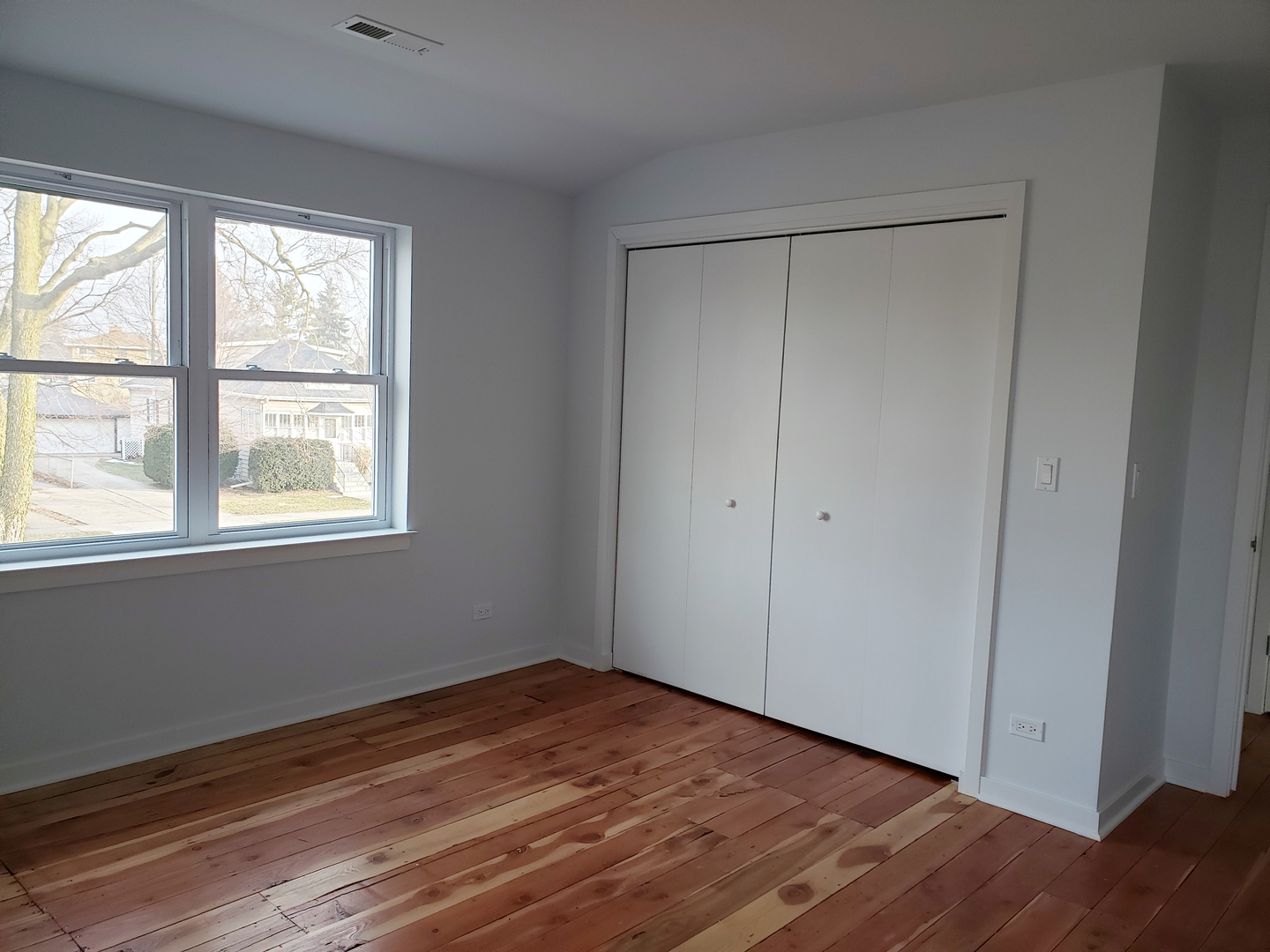 57 Northgate Road Riverside, IL 60546 - Photo 21 of 28 a view of empty room with wooden floor and fan