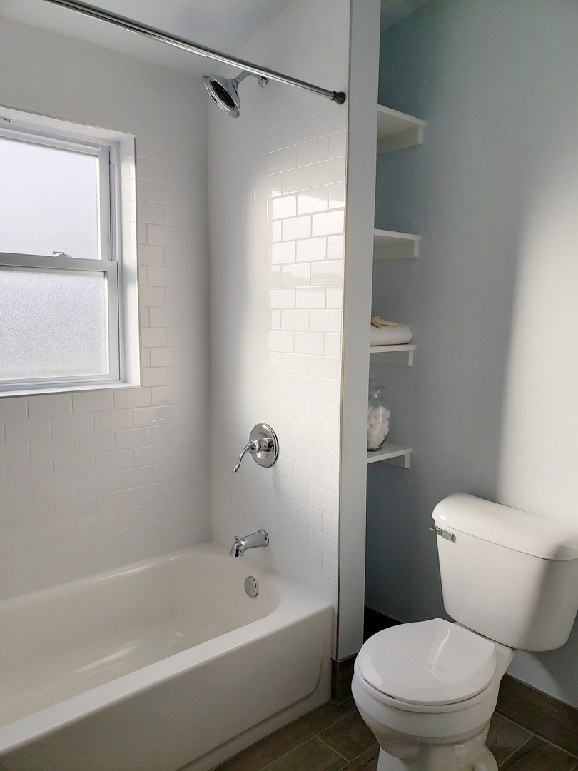 57 Northgate Road Riverside, IL 60546 - Photo 26 of 28 a bathroom with a toilet bathtub and shower
