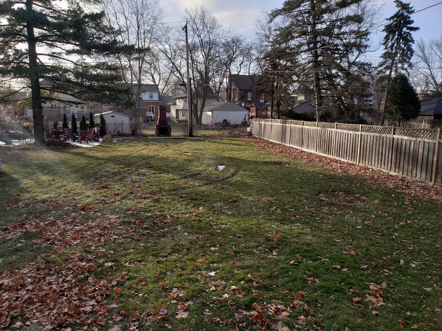 57 Northgate Road Riverside, IL 60546 - Photo 28 of 28 a view of a yard with a house in the background