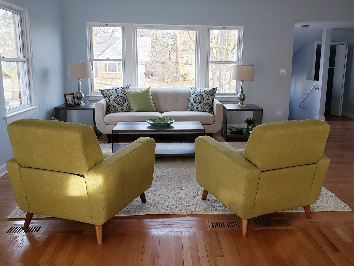 57 Northgate Road Riverside, IL 60546 - Photo 6 of 28 a living room with couches and a coffee table with wooden floor