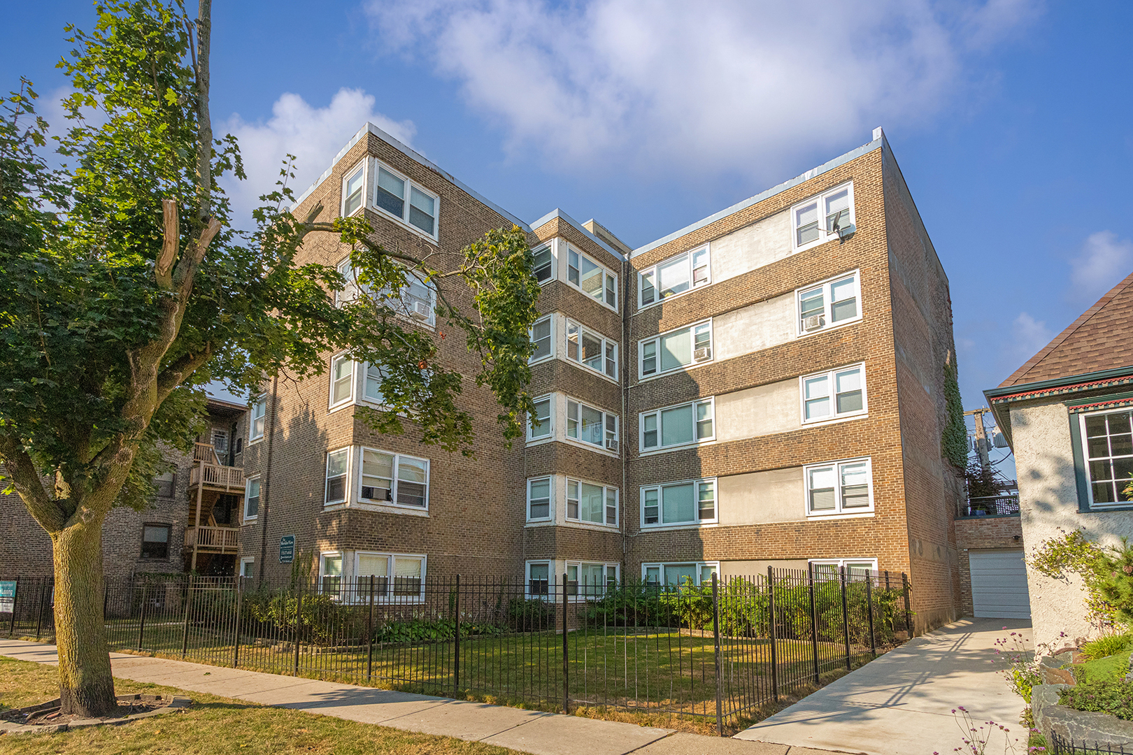 7710 North Sheridan Road, Unit 304 Chicago, IL 60626 - Photo 1 of 13 a front view of a building
