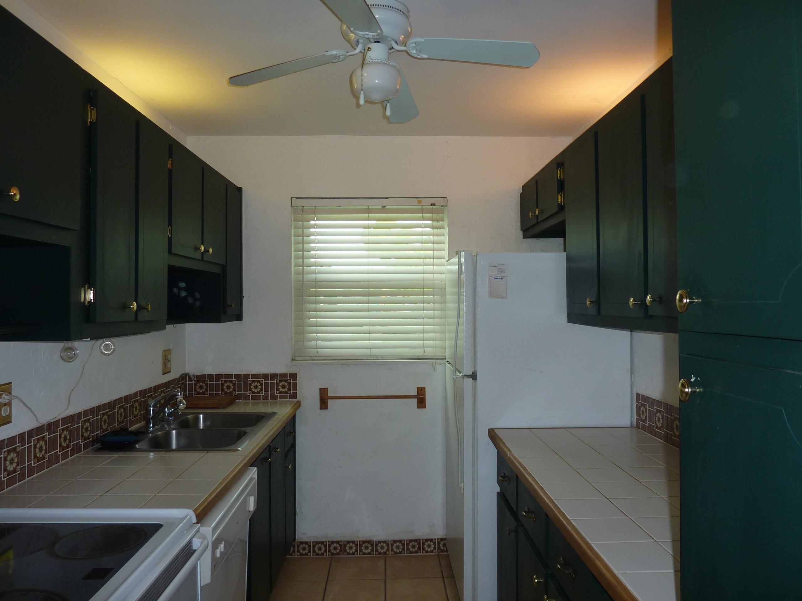170 North High Point, Unit C Boynton Beach, FL 33435 - Photo 9 of 37 Kitchen galley view