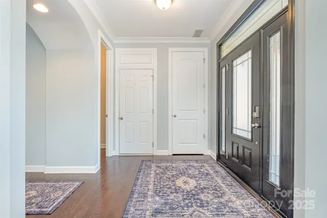 a view of hallway with livingroom and hallway