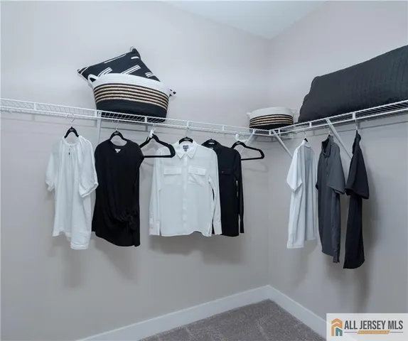 a bathroom with a shower toilet and sink