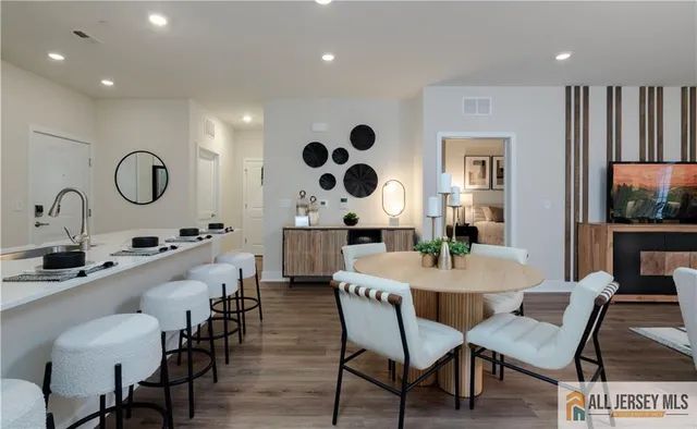 a view of a dining room and chairs