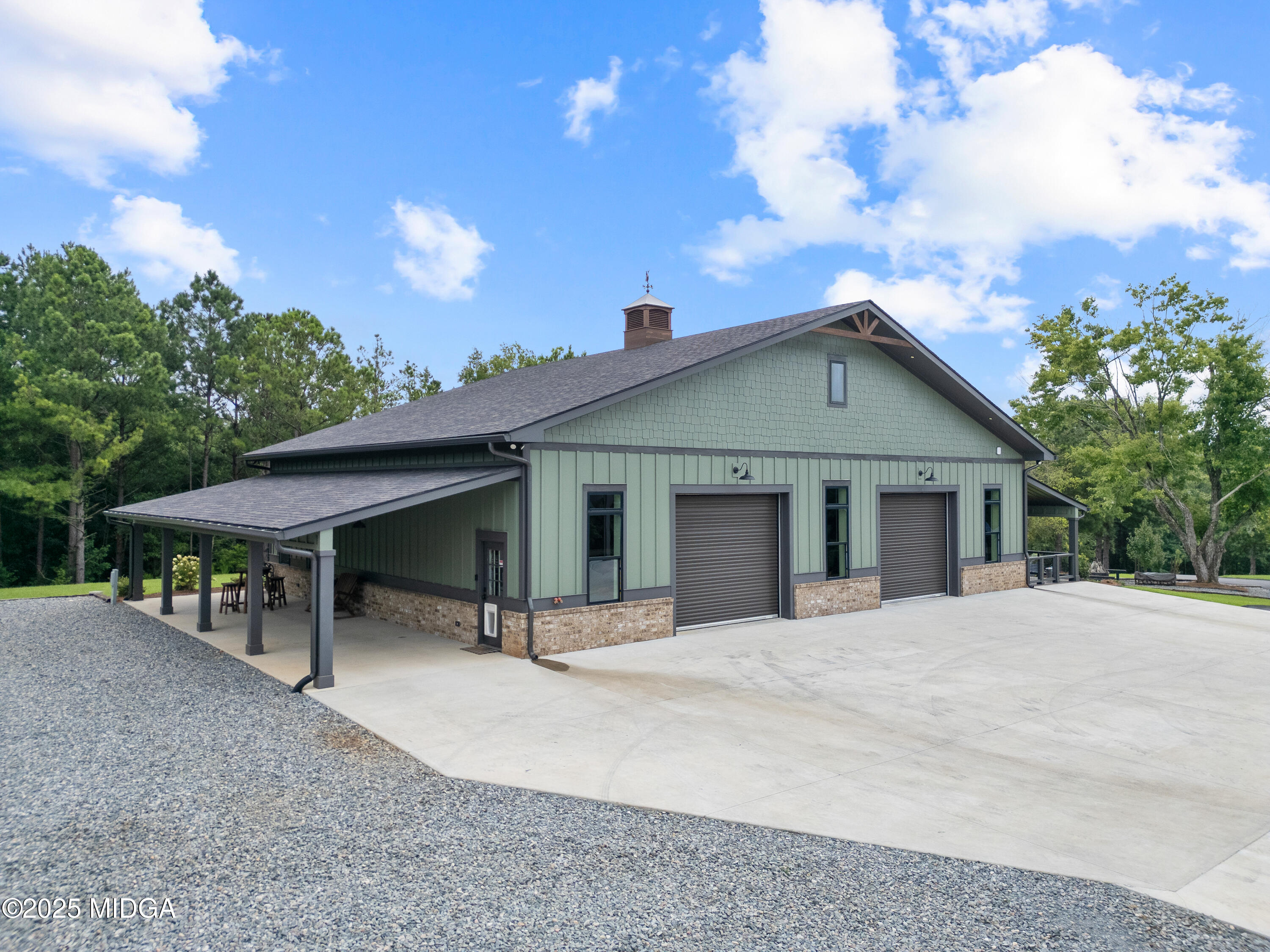 a view of a house with porch and sitting area