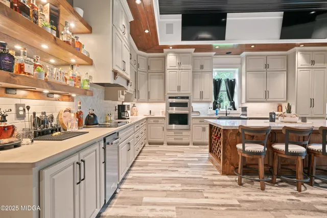 a bed room with a bed and a large window