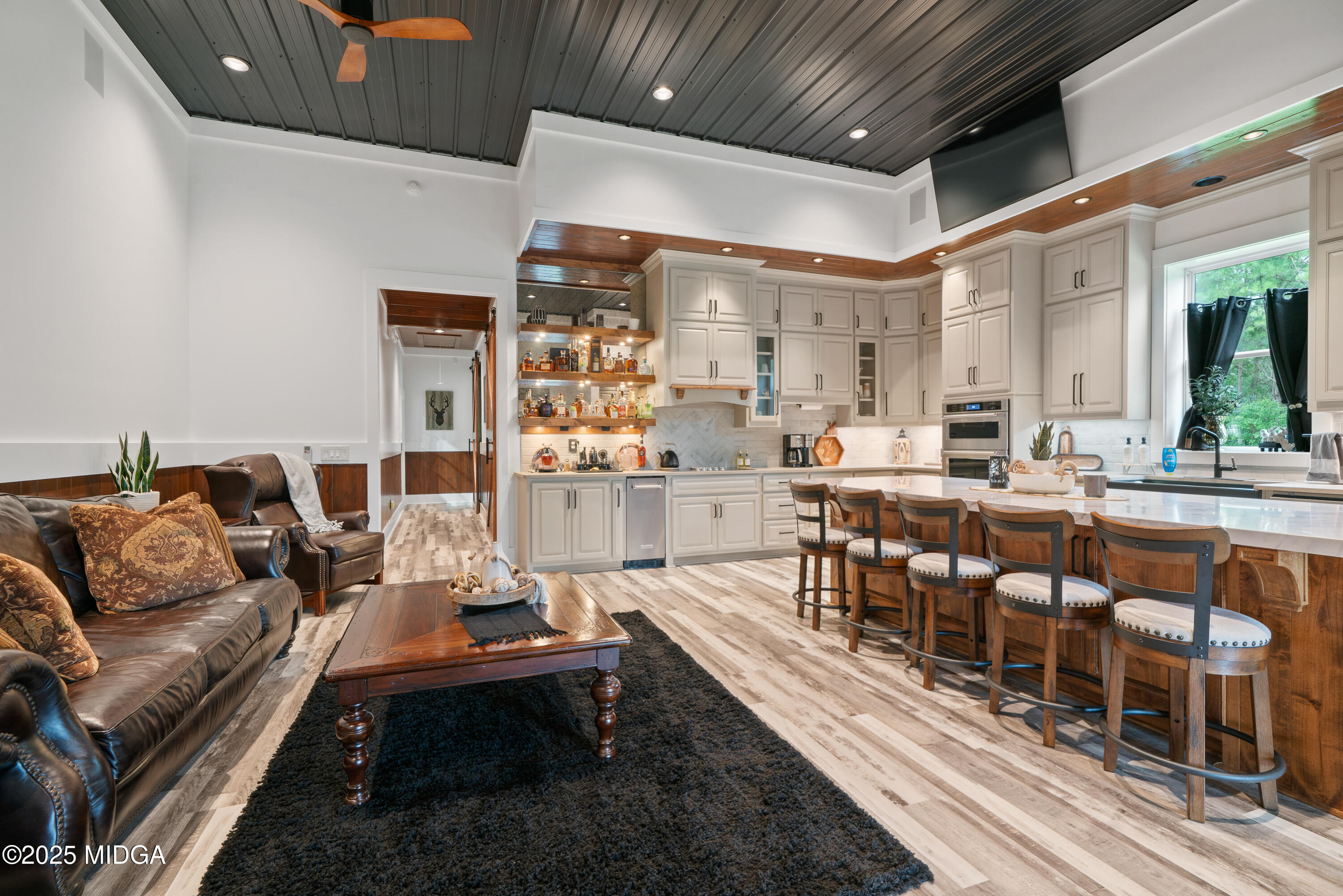 1971 Highway 49 Gray, GA 31032 - Photo 24 of 98 a living room with lots of furniture and a table