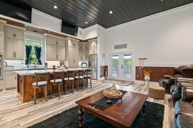 a bathroom with a sink vanity and a mirror