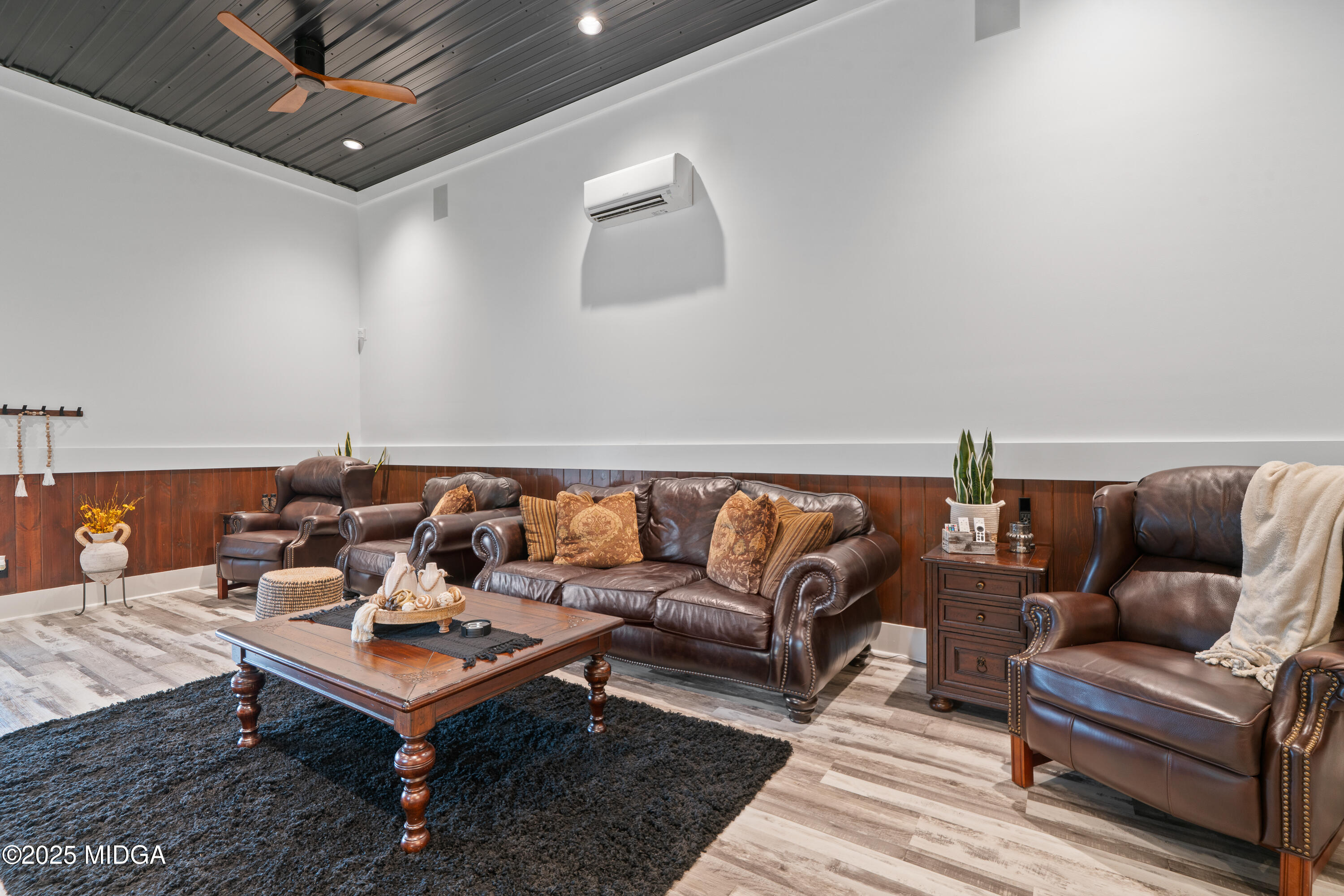 1971 Highway 49 Gray, GA 31032 - Photo 34 of 98 a living room with furniture a rug and a table