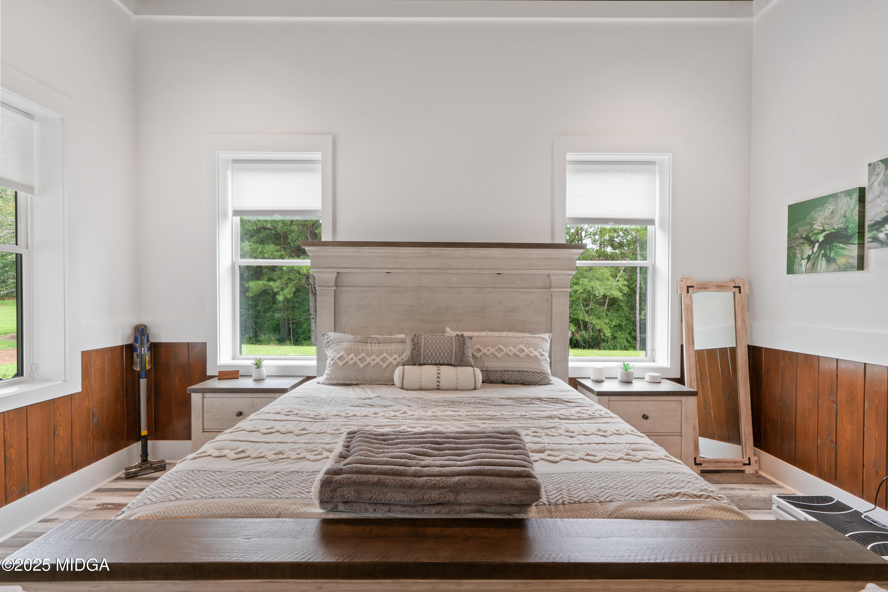 1971 Highway 49 Gray, GA 31032 - Photo 38 of 98 a bedroom with a large bed and wooden floor