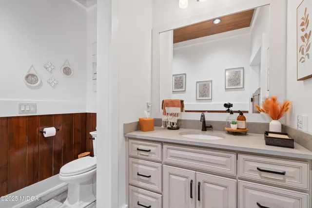 a view of a house with a backyard porch and sitting area