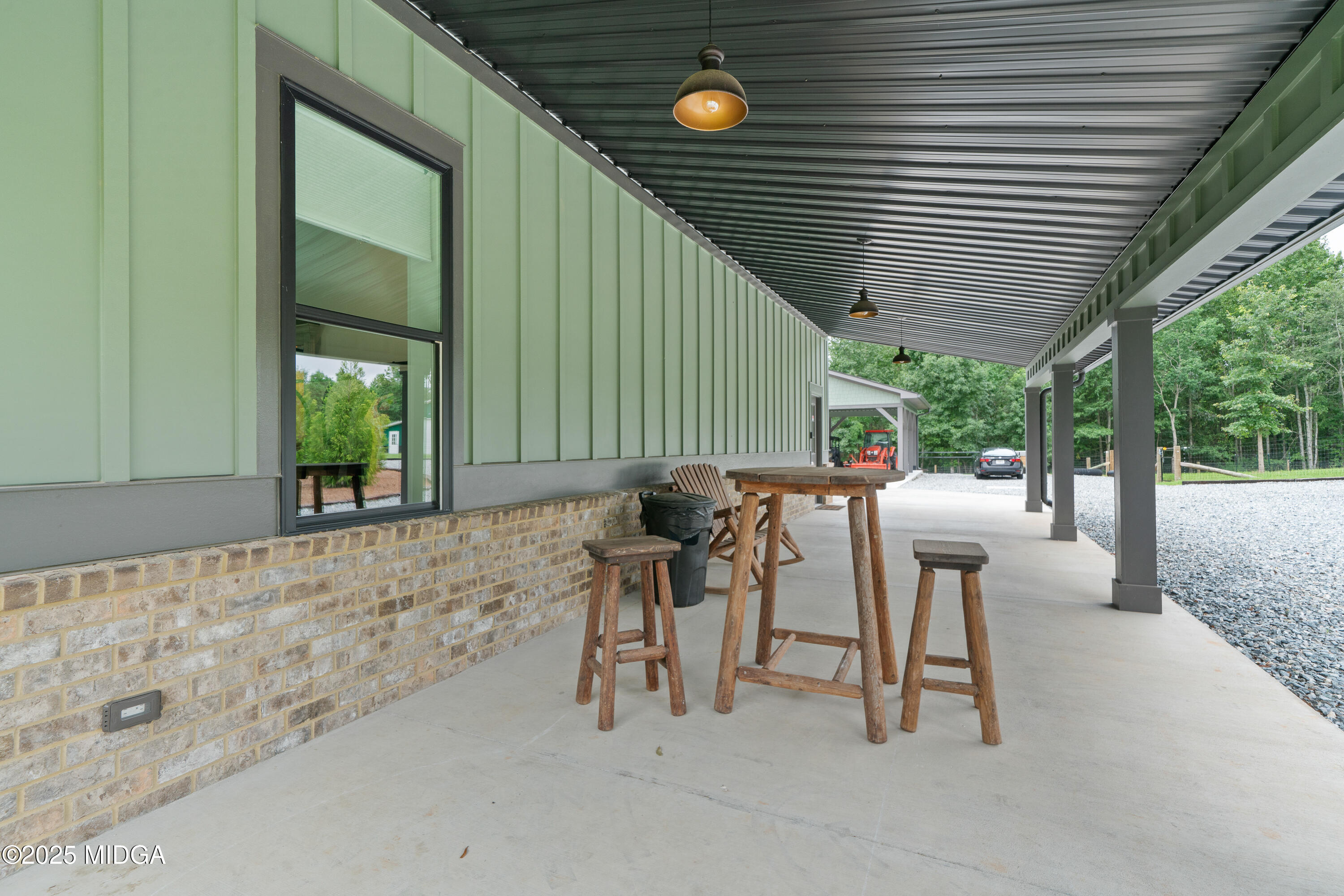 1971 Highway 49 Gray, GA 31032 - Photo 63 of 98 a view of a patio with table and chairs and potted plants