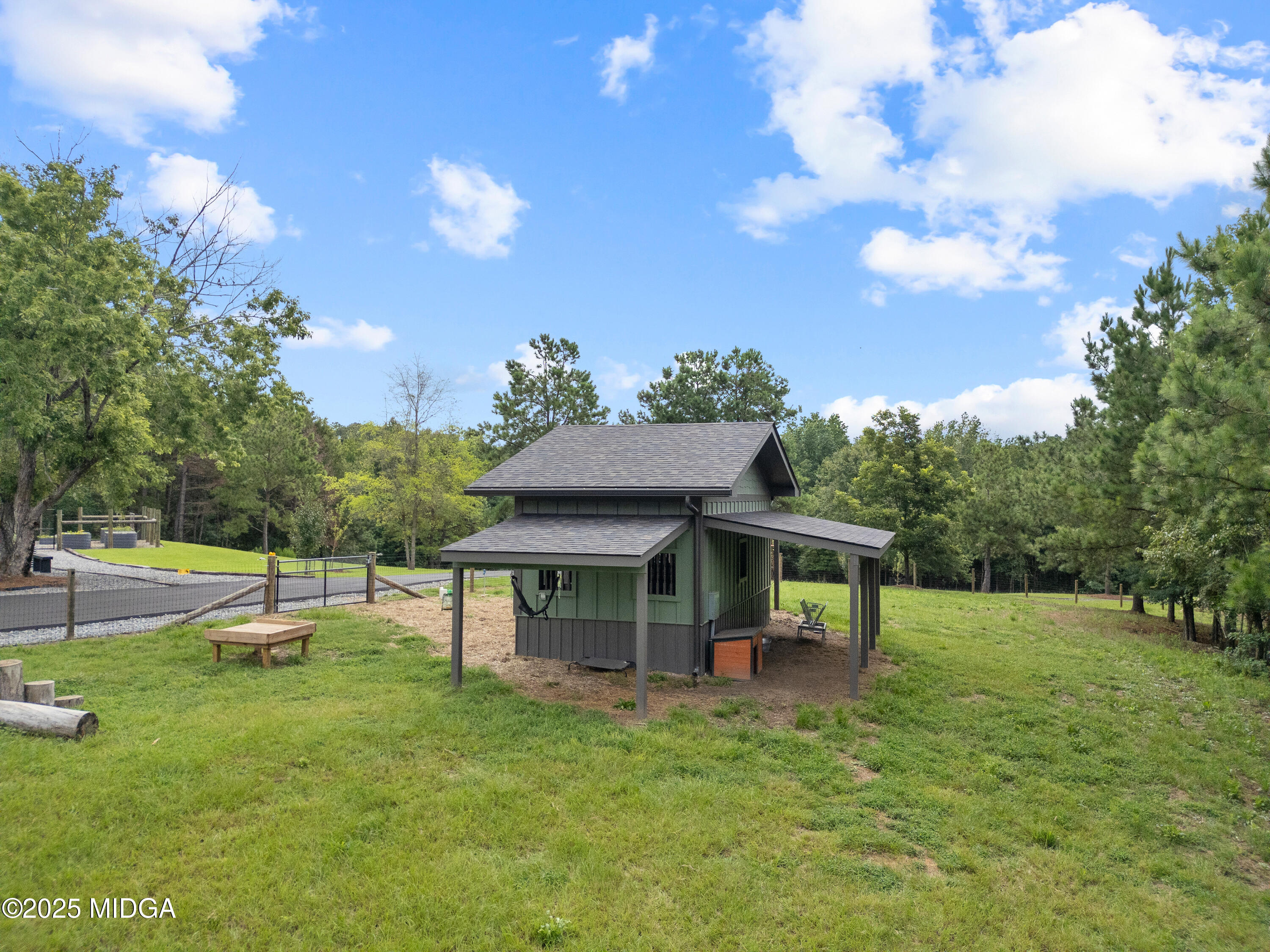 1971 Highway 49 Gray, GA 31032 - Photo 95 of 98 a view of a house with a backyard porch and sitting area