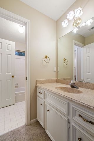 a view of bathroom with dual sinks